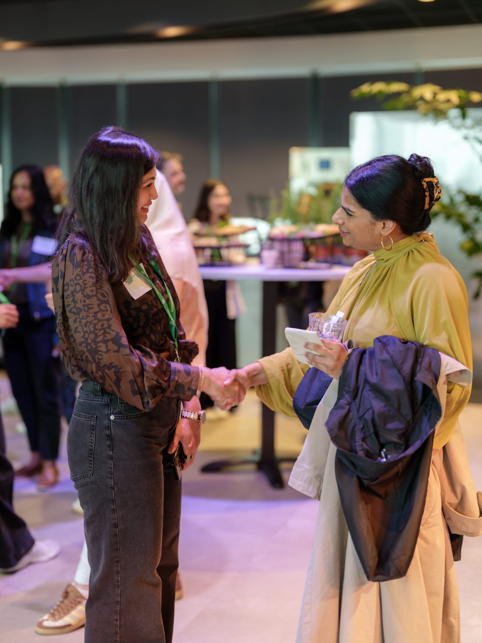 Practitioners connecting at a community gathering